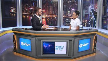 Encompass HK LGBTQ Gay Lesbians Hong Kong HK Mentorship LGBTQ+ Diversity Inclusion Sustainability Sustainable SDGs Sustainable Development Goals SDG Game Responsible Consumption Workshops Belonging D&I DEI Two people sit across from each other at a news desk in a brightly lit TV studio with cityscape windows. The desk’s screens display viuTV and WEEKLY RE-VIU as they engage in conversation about sustainability and current events.